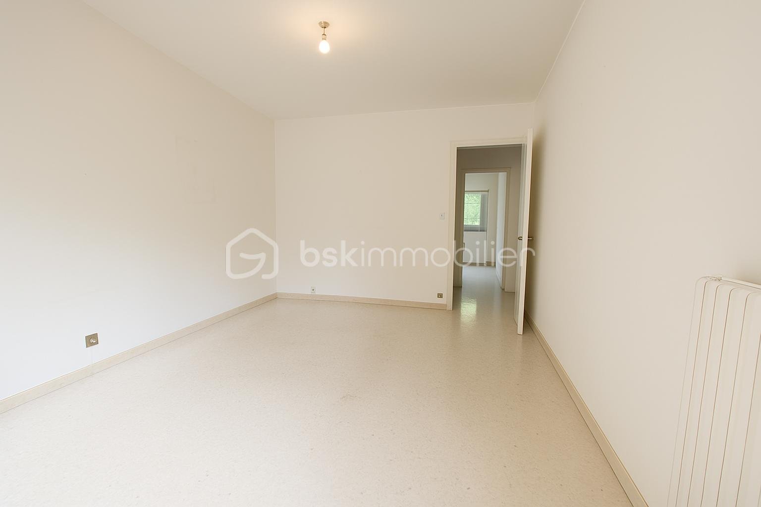 Appartement de 75,70 m² - chambre 1 2 pub.png