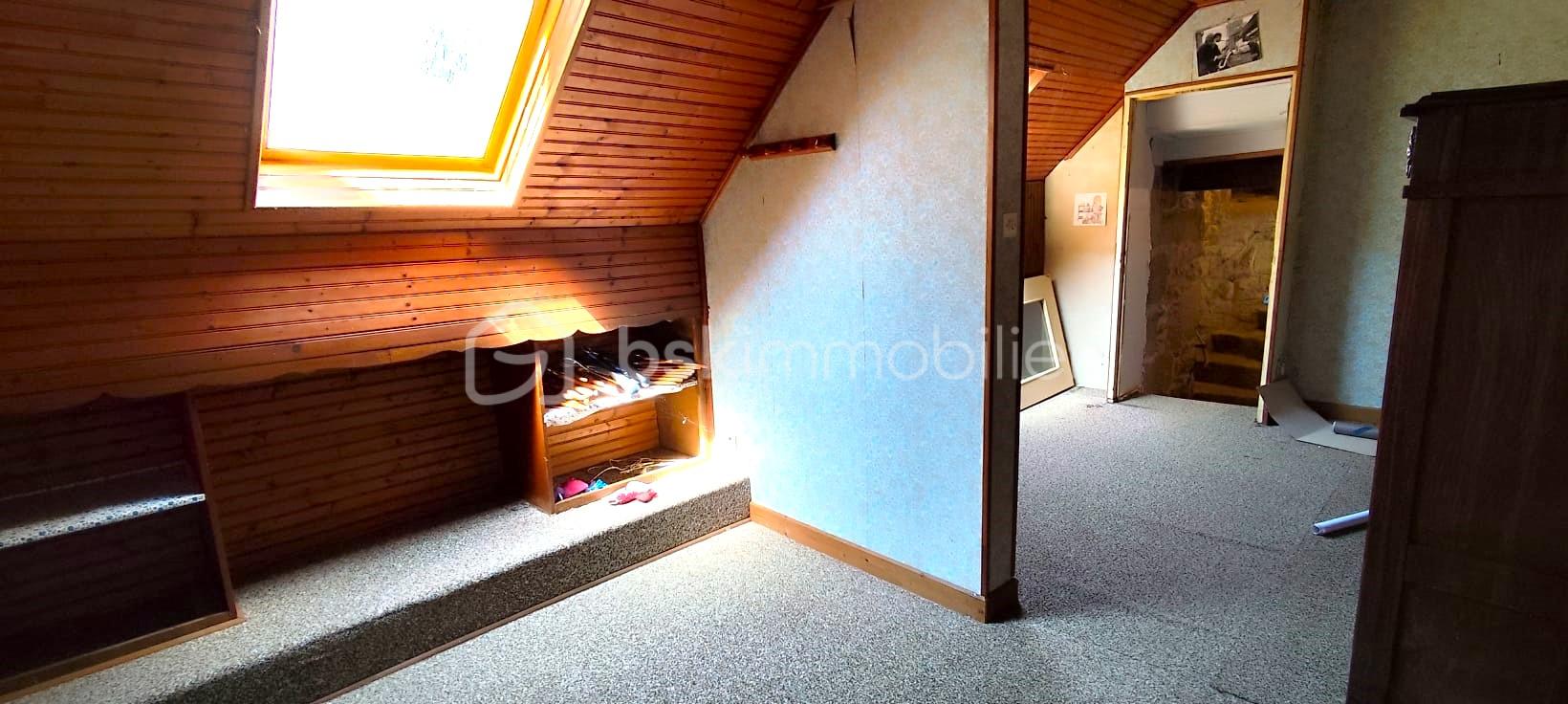 Maison de 120 m² - Chambre demi étage.jpg
