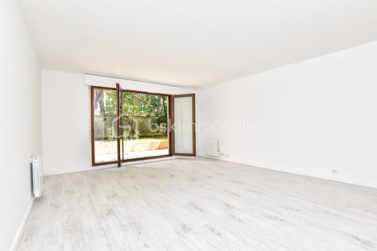 Appartement de 82,83 m² - Ariana immobilier-agence immobiliere-paris-appartement-T3-Paris 14-séjour-003.jpeg