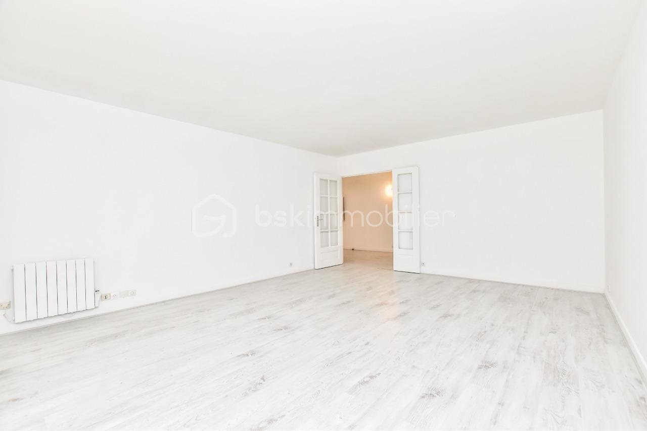 Appartement de 82,83 m² - Ariana immobilier-agence immobiliere-paris-appartement-T3-Paris 14-séjour-002.jpeg