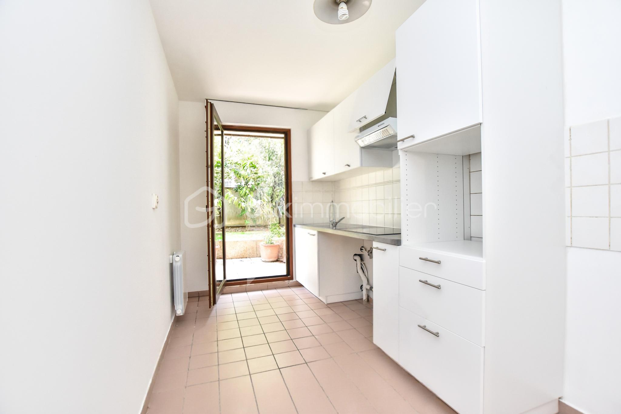 Appartement de 82,83 m² - Ariana immobilier-agence immobiliere-paris-appartement-T3-Paris 14-cuisine-001.png