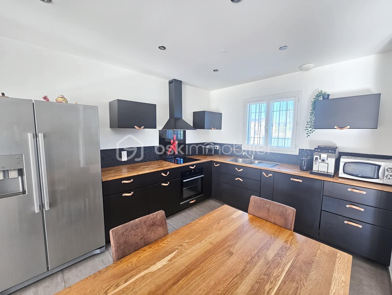 Maison de 100 m² - 9644cce73d6c8be-1.png