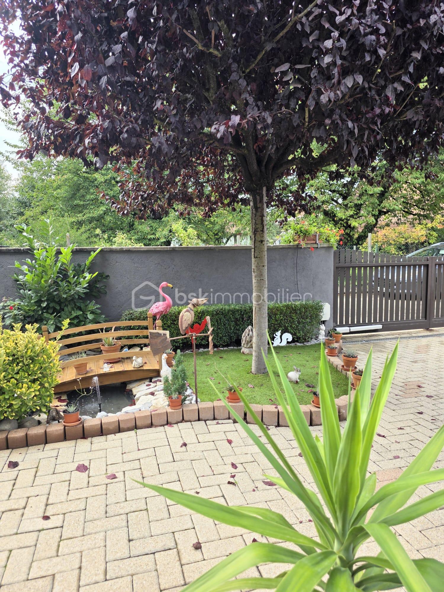 Maison de 124 m² - EXTERIEUR COUR.jpg