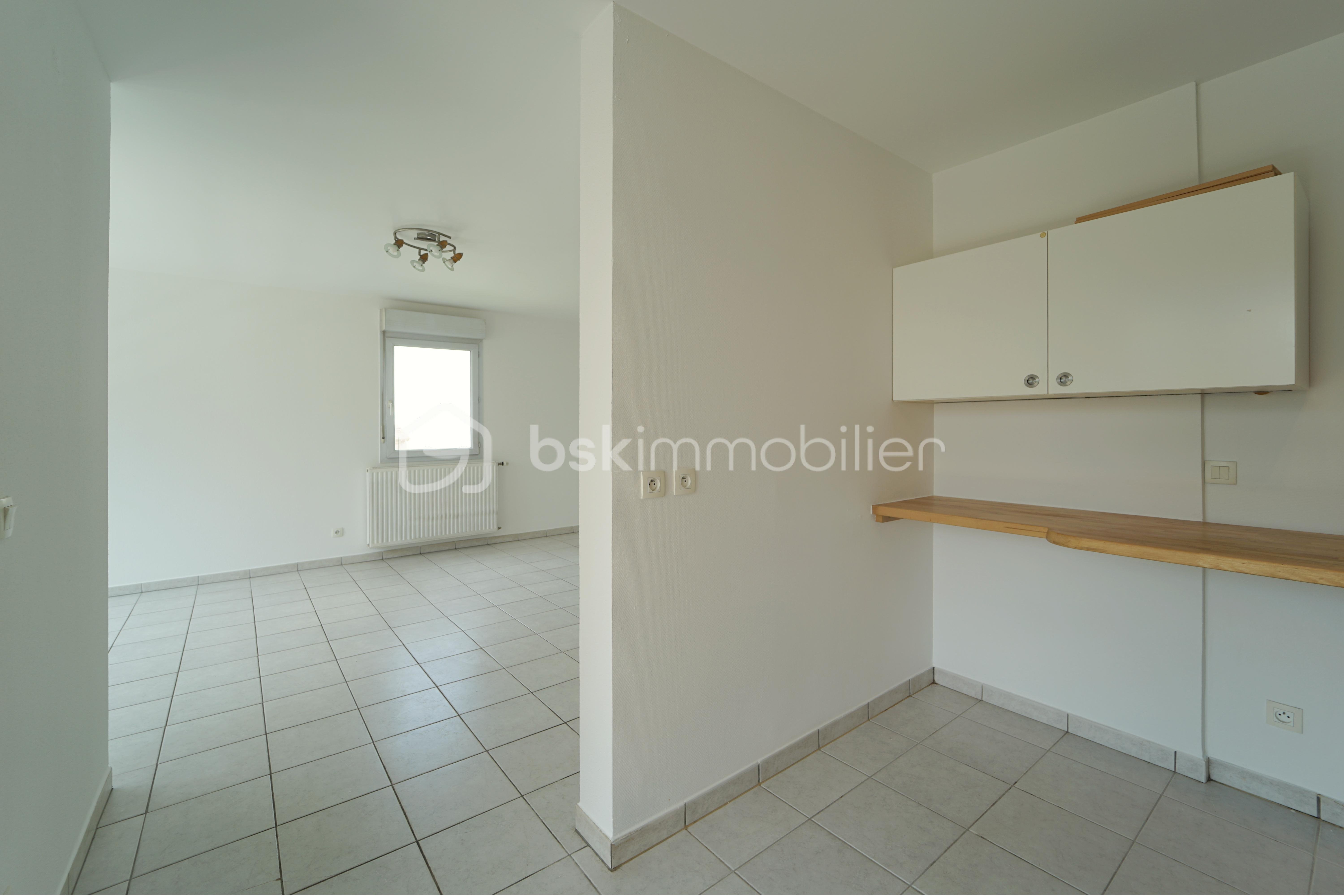 Appartement de 89,35 m² - 4 - cuisine sejour.JPG