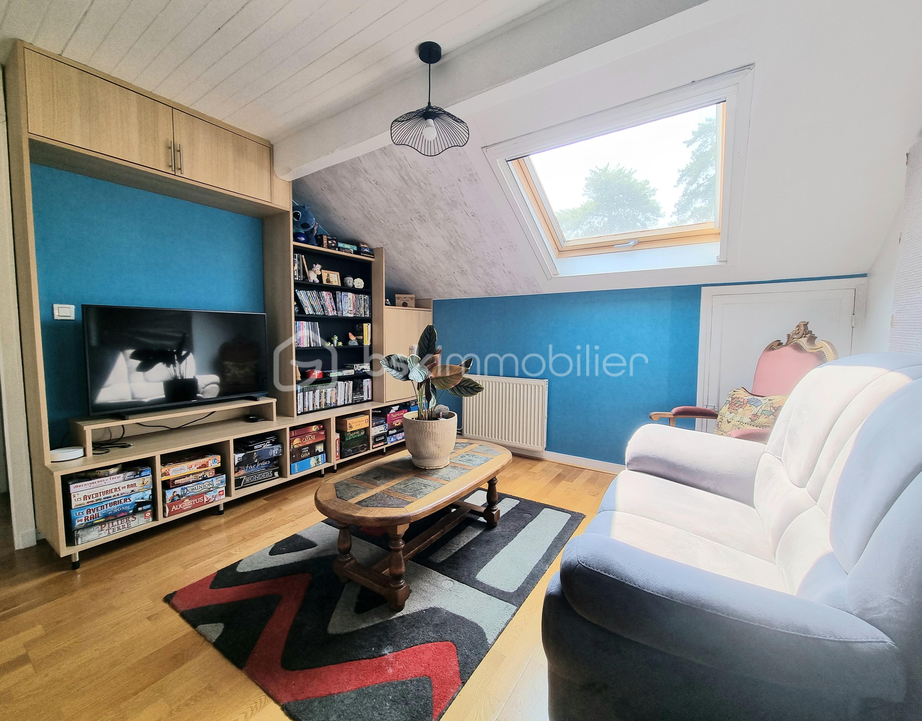 Maison traditionnelle de 193 m² - salle de jeux.jpg