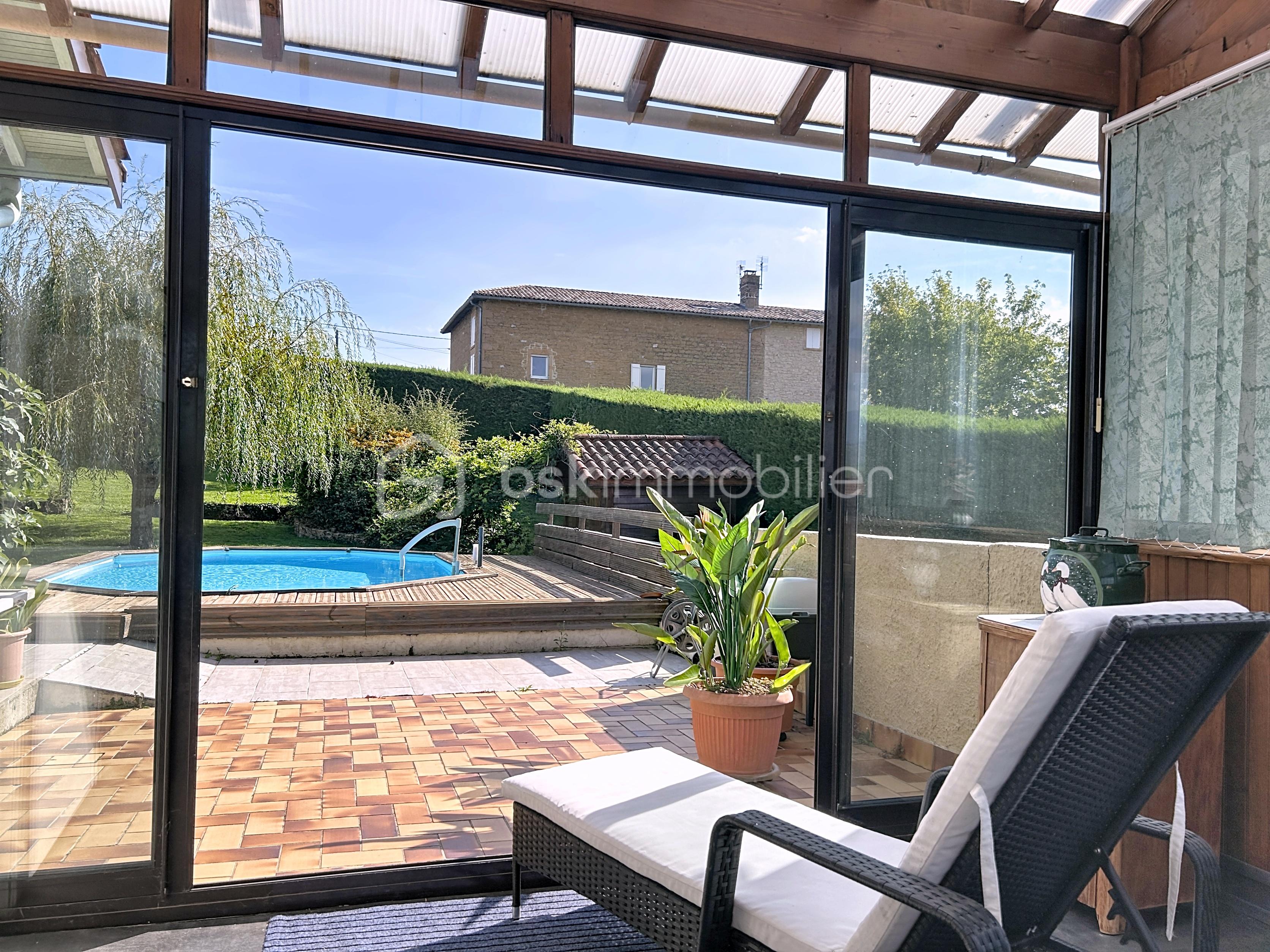 Maison traditionnelle de 134 m² - Véranda (2).jpg