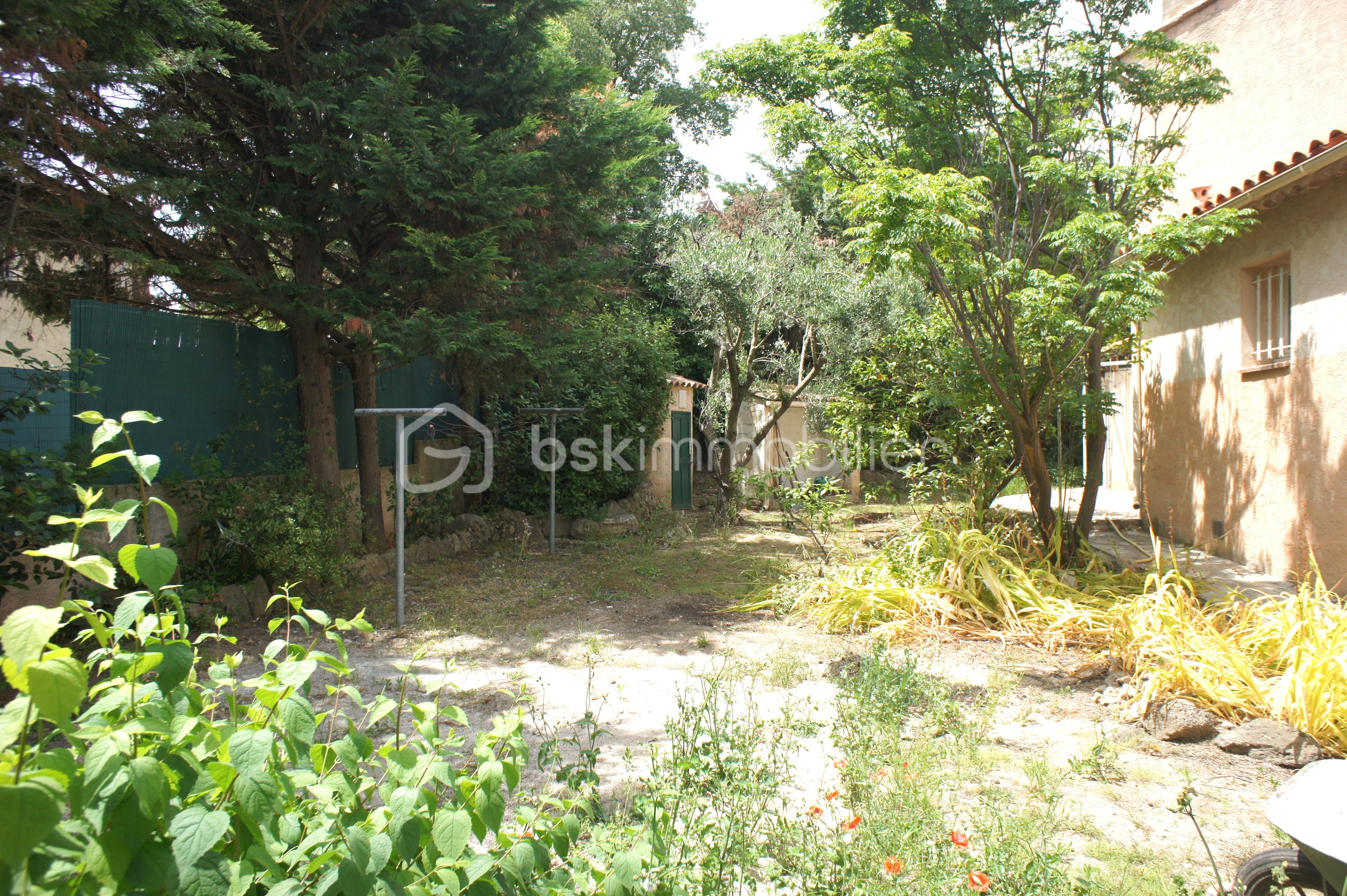 Maison de 128 m² - A14 JARDIN ARRIERE.JPG