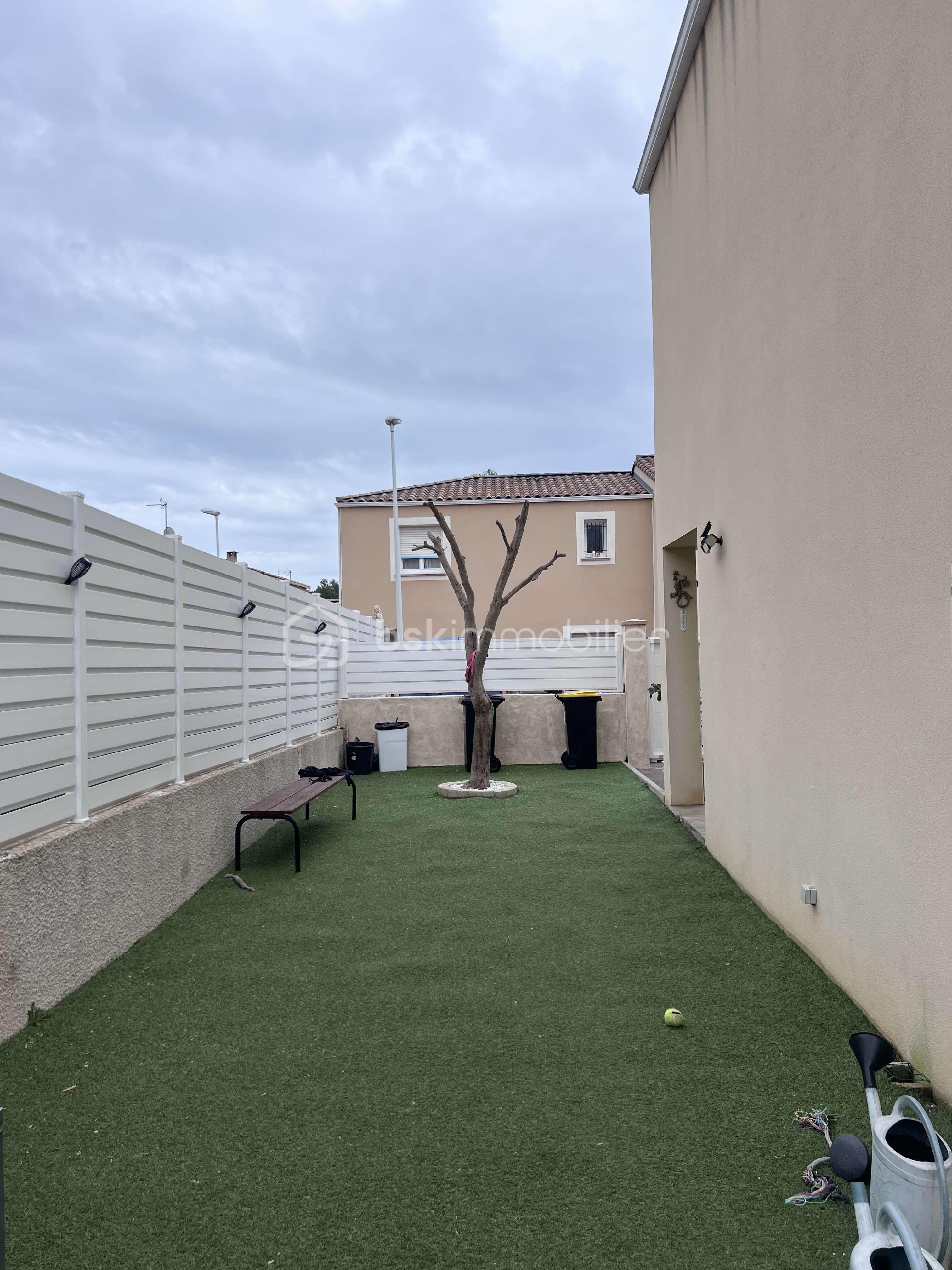 Maison de 85 m² - jardin cote.jpg