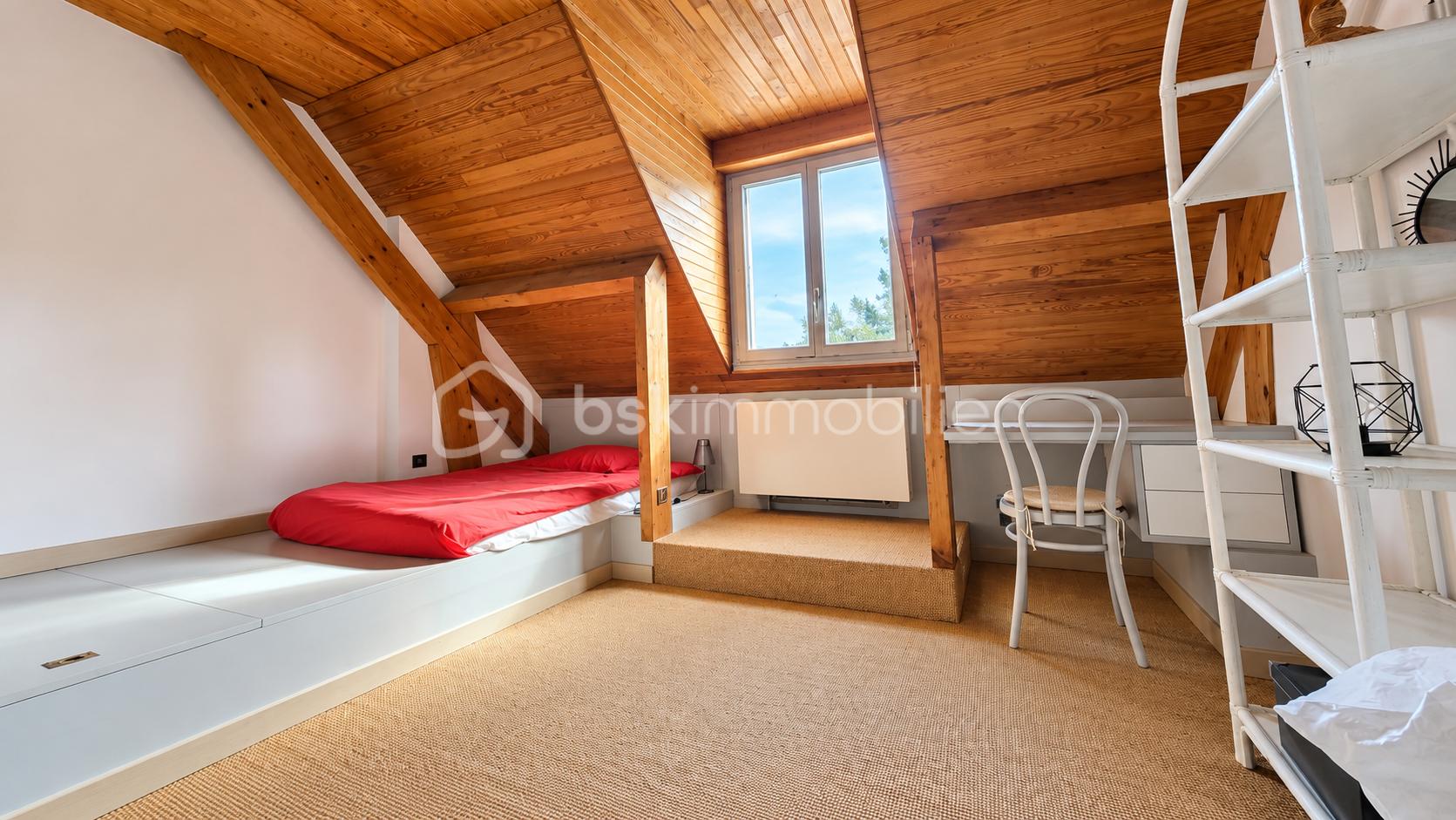 Chambre mansardée chaleureuse sous les combles (1).png