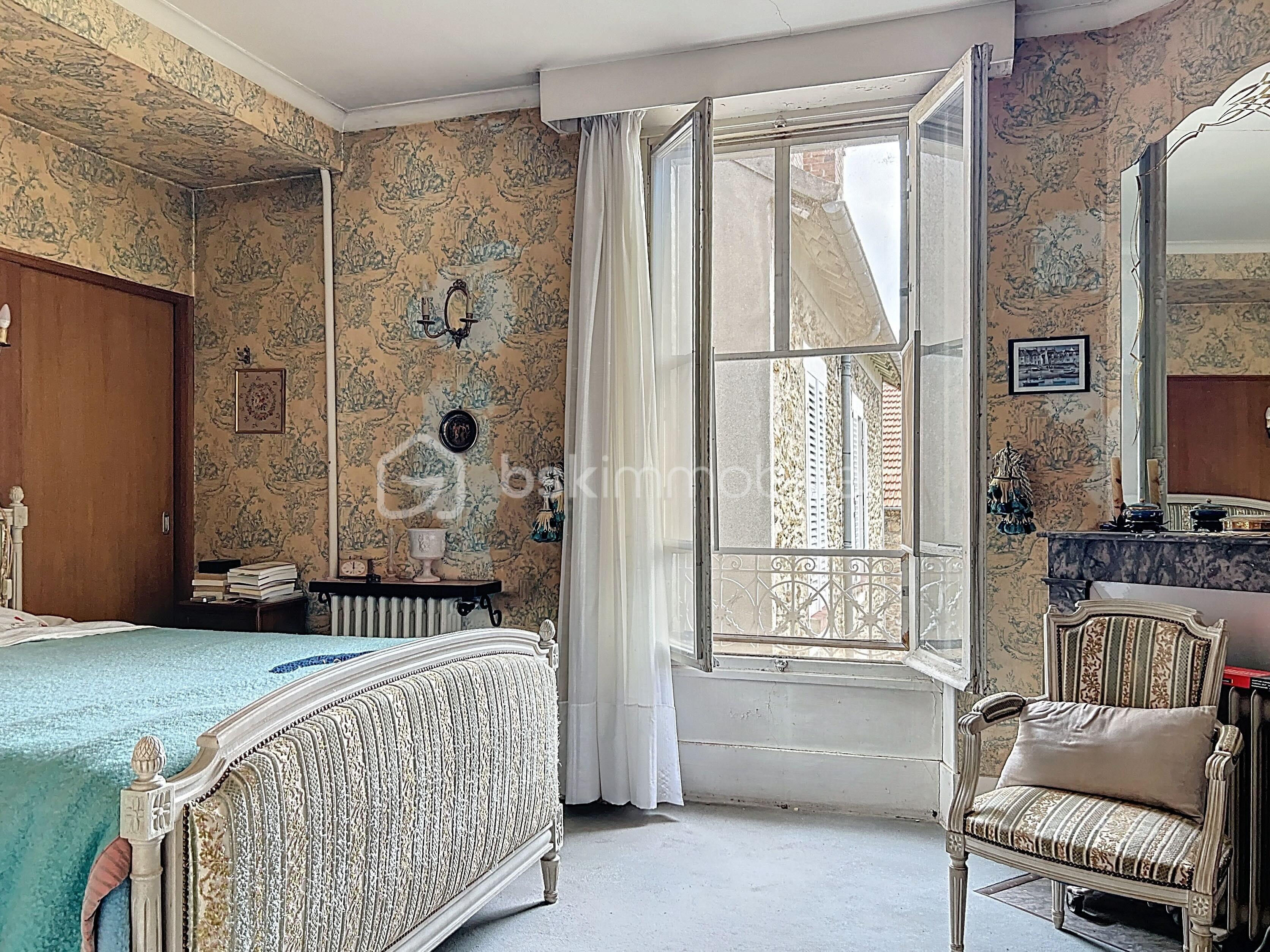 Maison de 130 m² - rue-du-champ-des-epreuves_00008.jpeg