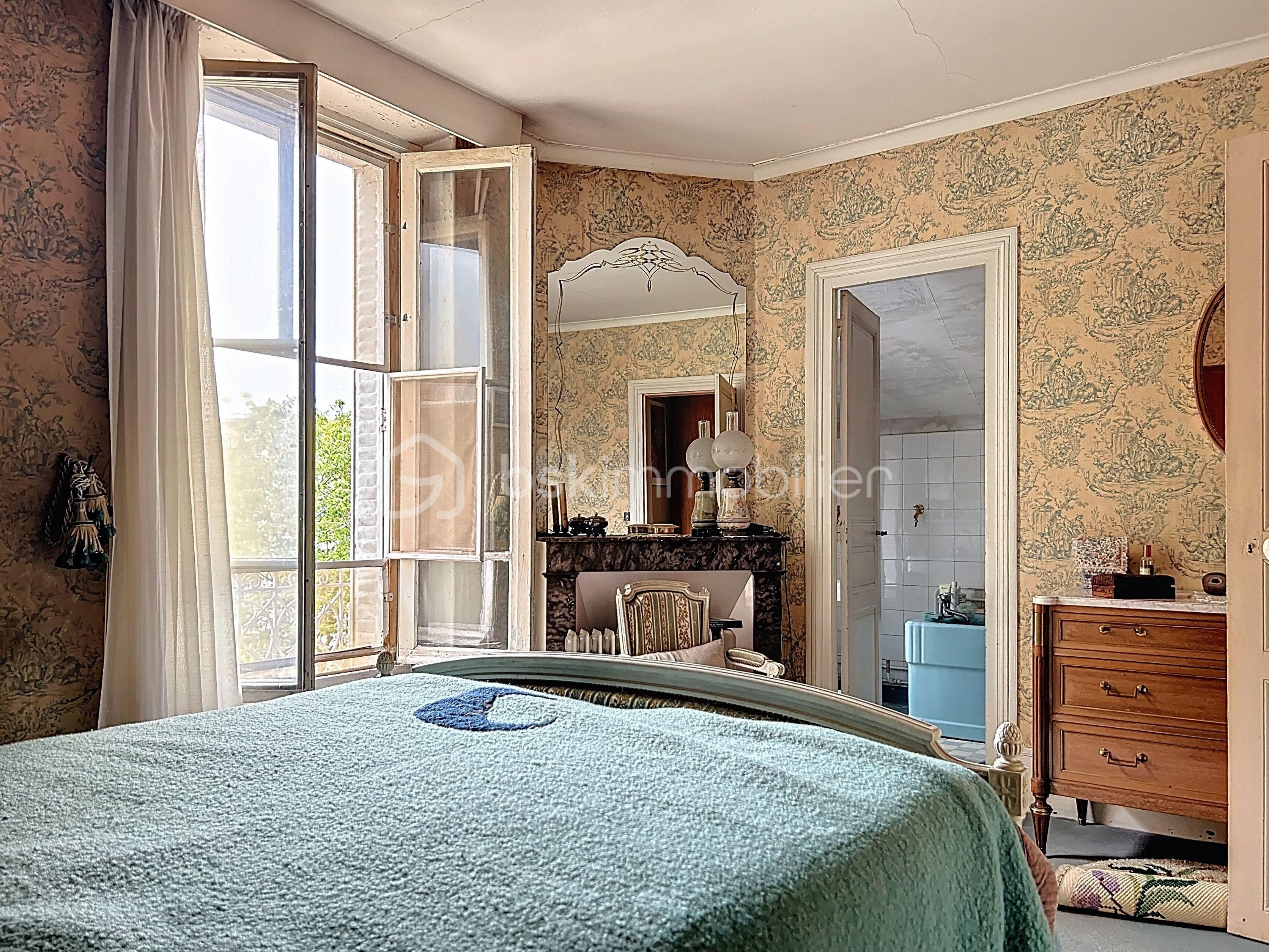 Maison de 130 m² - rue-du-champ-des-epreuves_00009.jpeg