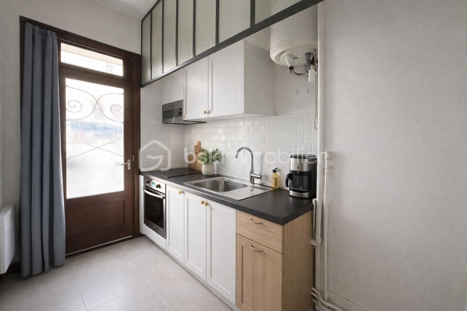 Appartement de 35,03 m² - Cuisine moderne et lumineuse.png